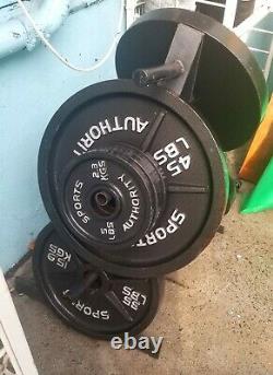 180 lbs weight plate set with stand (2) 45lb, (2) 35lb, (4)5lb Local pickup