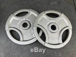 (2) 45 lb Olympic Weight Plates. PAIR OF FITNESS GEAR 45 LB OLYMPIC GRIP PLATES
