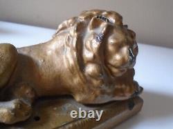 Antique Painted Cast Iron reclining lion Door stop 5.5 L 3H Approx 2 1/2 lbs
