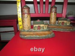 Antique cast iron Lighthouse bookends door stops numbered T698 6.5 6 lbs each