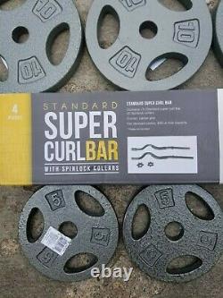 CAP Curl Bar + 60lbs total CAP plates (4)10lbs (4) 5lbs 1 Curl Bar 4 pc set