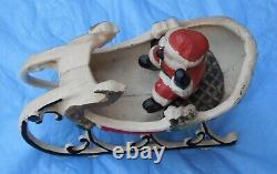 Cast Iron Santa + Sleigh. 7.5 long. 3.25 lbs-old er