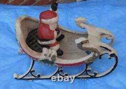 Cast Iron Santa + Sleigh. 7.5 long. 3.25 lbs-old er