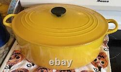 Le Creuset Enameled Cast Iron Signature Oval Dutch Oven, 9.5 qt, Yellow