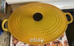 Le Creuset Enameled Cast Iron Signature Oval Dutch Oven, 9.5 qt, Yellow