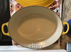 Le Creuset Enameled Cast Iron Signature Oval Dutch Oven, 9.5 qt, Yellow