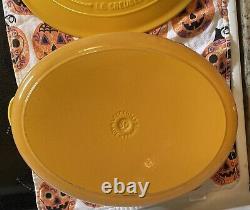 Le Creuset Enameled Cast Iron Signature Oval Dutch Oven, 9.5 qt, Yellow