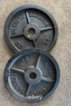 New pair rare cast-iron heavy duty hard to find 45 lb plates. BFCO OLYMPIC