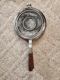 The Griswold MFG Co. #8 PAT 154 Cast iron Cooking base and Carrying base waffle