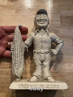 Vintage Seed Sales Award Door Stop 9+ LBS Cast Iron Metal Patina Farm Collector