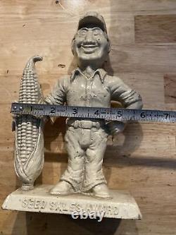 Vintage Seed Sales Award Door Stop 9+ LBS Cast Iron Metal Patina Farm Collector