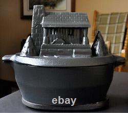Bouilloire en fonte pour poêle à granulés en bois dans une cabane en rondins - humidificateur d'air rustique